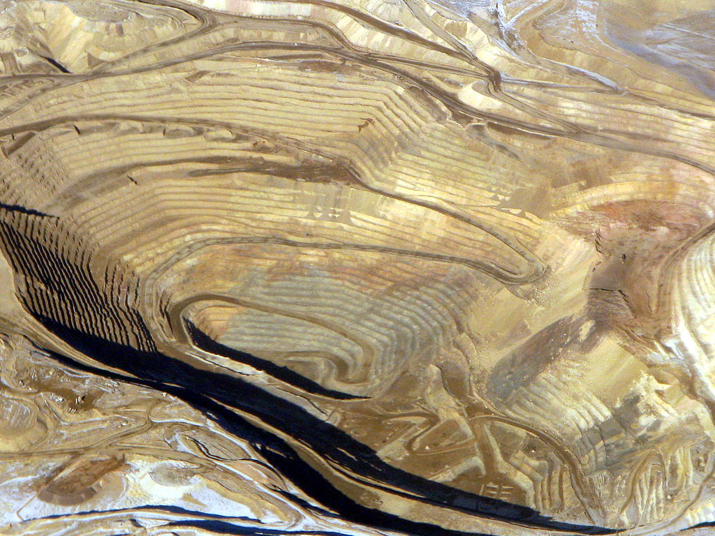 Round Mountain goldmine, from Wikimedia.org https://upload.wikimedia.org/wikipedia/commons/thumb/3/32/Round_Mountain_gold_mine%2C_aerial.jpg/1024px-Round_Mountain_gold_mine%2C_aerial.jpg